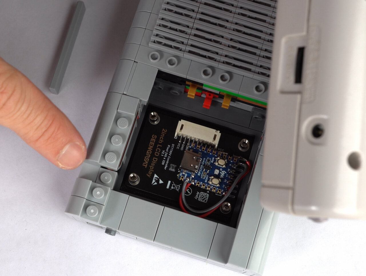 Photo of the Lego Game Boy with parts removed to make room for the new display.